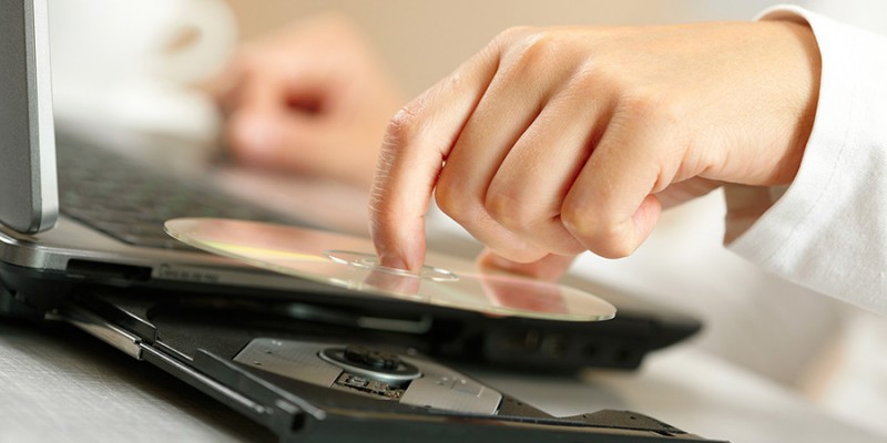 Woman hand with CD